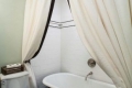 Pravidla pro praní záclon v koupelně: zbavení se žlutosti